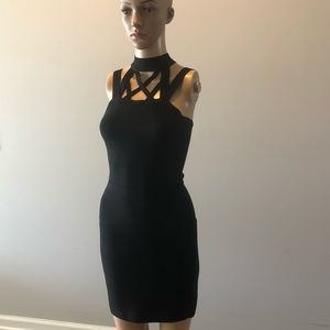 Strappy black bebe dress